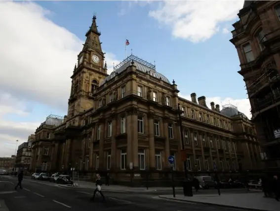  ?? (PA) ?? Liverpool’s Grade II-listed Municipal Building was sold at a time when the council said it needed to find £90m savings because of central government cuts