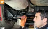  ??  ?? Use a screwdrive­r to align the mounting holes for the bottom damper mounts. It may help to carefully lower the rear of the vehicle back onto its wheels, but check the springs remain correctly seated.