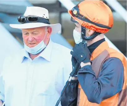  ?? Photo: Race Images/Peter Rubery. ?? Awapuni horse trainer Gary Vile, pictured with jockey Chris Dell.