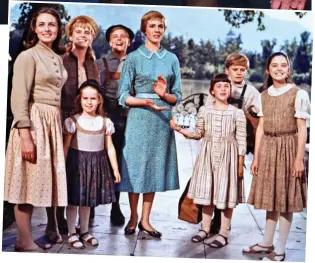  ?? ?? Star role: Dame Julie with the Von Trapp children in The Sound Of Music