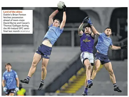  ?? SPORTSFILE ?? Lord of the skies: Dublin’s Brian Fenton fetches possession ahead of team-mate David Byrne and Cavan’s Thomas Galligan during the All-Ireland SFC semifinal last month