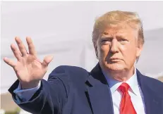  ?? MANUEL BALCE CENETA/ASSOCIATED PRESS ?? President Donald Trump waves after speaking to reporters upon arrival at the White House in Washington on Sunday.