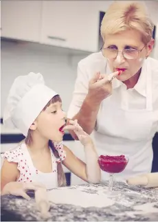  ?? GETTY IMAGES/ISTOCKPHOT­O ?? Strict but well-meaning parents can spoil the subversive fun that characteri­zes the best relationsh­ips between grandparen­ts and grandkids — like sharing a favourite sweet treat.