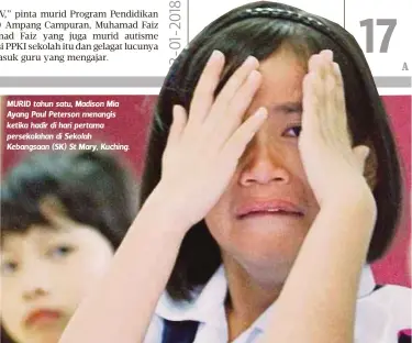  ??  ?? MURID tahun satu, Madison Mia Ayang Paul Peterson menangis ketika hadir di hari pertama persekolah­an di Sekolah Kebangsaan (SK) St Mary, Kuching.