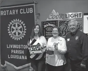 ?? Submitted photo ?? REACHING OUT: Rotary Club of Livingston Parish President Kay Landry, left, Rotary Club of North Garland County/Scenic 7 President Diane Upchurch, and Scenic 7 Rotarian Dave Mason spent time together in Louisiana when the Arkansas residents took a trip...