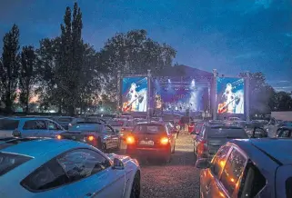  ?? /Getty Images/Anadolu ?? Cocooned: Drive-in concerts are being staged, with punters sitting in their cars and listening on their radios to the show.