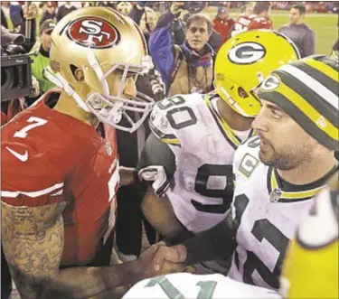  ??  ?? Colin Kaepernick deserves to be on an NFL roster, according to Packers quarterbac­k Aaron Rodgers.