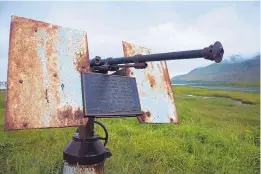  ?? LISA HUPP/U.S. FISH AND WILDLIFE SERVICE ?? An artillery monument sits above Massacre Bay on Attu Island, Alaska, where one of the bloodiest WWII battles was waged, the only fighting on American soil.