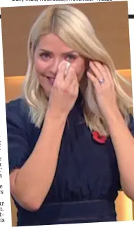  ??  ?? Emotion: Holly sobs on live TV after hearing Paul play