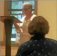  ?? GINGER RAE DUNBAR – DIGITAL FIRST MEDIA ?? Retired school teacher and main speaker, Lee Dastur, speaks at a public meeting for the grassroots organizati­on Gun Sense Chester County about the economic and cultural impact of gun violence.