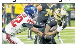  ?? Corey Sipkin ?? ‘FEEL AT HOME’: When Adoree’ Jackson — making the tackle on the Saints’ A.T. Perry last Sunday — signed with the Giants, it was because he was “comfortabl­e” with Big Blue.