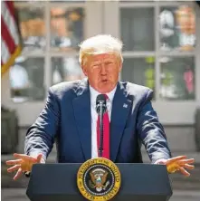  ?? THE ASSOCIATED PRESS ?? President Donald Trump speaks about his plan to pull the U.S. out of the Paris climate change accord Thursday in the Rose Garden of the White House in Washington, D.C.