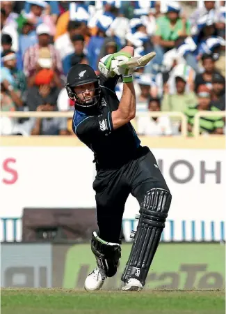  ??  ?? New Zealand opening batsman Martin Guptill goes on the attack during his matchwinni­ng innings in the fourth one-day internatio­nal in Ranchi.