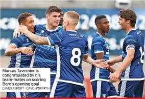  ?? CAMERASPOR­T - DAVE HOWARTH ?? Marcus Tavernier is congratula­ted by his team-mates on scoring Boro’s opening goal