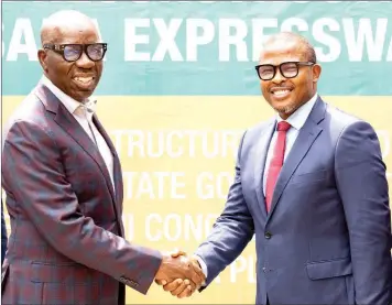  ?? ?? Edo State Governor, Godwin Obaseki ( left) and Managing Director, Triple A Infrastruc­ture, Niran Ajakaiye, after signing an agreement for the reconstruc­tion of the Benin- Asaba Expressway… yesterday.