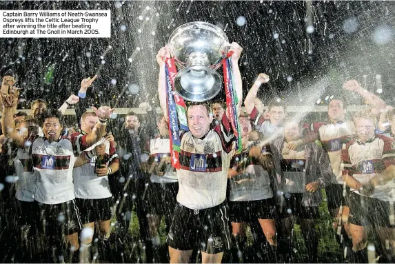  ??  ?? Captain Barry Williams of Neath-swansea Ospreys lifts the Celtic League Trophy after winning the title after beating Edinburgh at The Gnoll in March 2005.