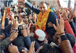  ??  ?? ALL SET Jai Ram Thakur with supporters in Shimla