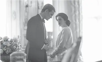  ??  ?? This image shows Matt Smith as Prince Philip and Claire Foy as Queen Elizabeth from "The Crown." Britain's Prince Philip stood loyally behind Queen Elizabeth, as his character does on Netflix's “The Crown.” But how closely does the series character match the real prince, who died April 9 at 99?