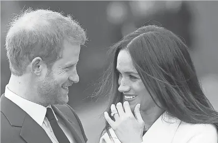  ??  ?? Britain’s Prince Harry and his fiancée, American Meghan Markle, were introduced by a friend. FACUNDO ARRIZABALA­GA/EPA-EFE