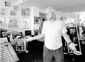  ?? TAIMY ALVAREZ/STAFF PHOTOGRAPH­ER ?? Former Dolphins and UM coach Jimmy Johnson stands in his damaged memorabili­a room after Hurricane Irma.