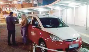  ??  ?? The Land Public Transport Commission arresting the taxi driver who allegedly charged two Bangladesh­i passengers RM950 for a 10km ride from KL Sentral to Setapak in Kuala Lumpur last Thursday.