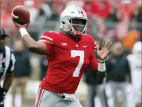  ?? JAY LAPRETE — ASSOCIATED PRESS ?? Ohio State quarterbac­k Dwayne Haskins drops back to pass against Rutgers during the first half on Sept. 8 in Columbus.