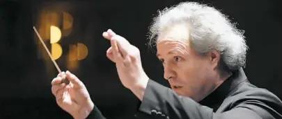  ?? Bill Wade/Post-Gazette ?? PSO music director Manfred Honeck might get fired if he loses too many games, but he seems to have a thick skin.