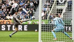  ?? Picture: Stu Forster/Getty Images ?? Pedro Porro of Tottenham Hotspur battles for the ball with Alexander Isak of Newcastle United during their Premier League match at St James’ Park in Newcastle yesterday.