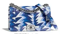  ??  ?? BOY CHANEL bag in white and blue printed leather
