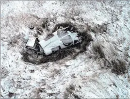  ??  ?? The Associated Press A photo provided Monday by the Morton County Sheriff ’s Office shows the wreckage of a Bismarck Air Medical airplane that crashed late Sunday, killing all three on board.