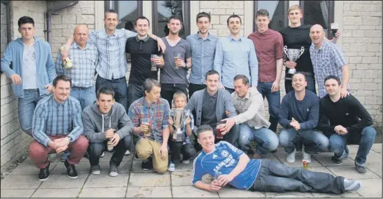  ??  ?? CHAMPIONS: Langtoft United Reserves are pictured after receiving the Peterborou­gh League Division Three championsh­ip trophy.