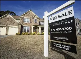 ?? MIKE STEWART/ASSOCIATED PRESS ?? In the 12-county core centered on the city of Atlanta, the number of homes listed for sale — inventory — rose 6% during March. (A home in Acworth is shown on the market above.) However, despite signs of improvemen­ts, Atlanta’s housing market is still unbalanced between buyers and sellers.