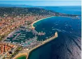  ?? ?? B E L O W : Crowds flocked to the glitzier of the two shows in Cannes, which recorded the same record number of visitors achieved at the 2019 show