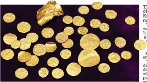  ?? ?? Treasure trove: Some of the coins and jewellery found in Norfolk