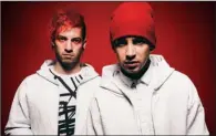  ??  ?? Twenty One Pilots — Josh Dun (left) and Tyler Joseph — bring their Grammy-winning, pop-flavored hip-hop to Verizon Arena on Friday.