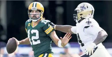  ?? Getty Images ?? NO LONGER ELITE: Despite the mauling Aaron Rodgers and the Packers took at the hands of Cameron Jordan and the Saints on Sunday, Green Bay still figures to contend in the weak NFC North — but not much beyond that writes VSiN’s Matt Youmans.