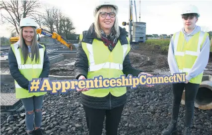  ??  ?? The newly launched apprentice­ship scheme from the Constructi­on Industry Training Board Northern Ireland (CITB NI) is now open for applicatio­n. Pictured are aspiring constructi­on apprentice­s Rebecca Mccleary and Jake Bishop with Amanda Stevenson from CITB NI (centre).