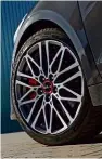  ??  ?? EQUIPMENT
GT range-topper features 18-inch multi-spoke alloy wheels to go with subtly sportier styling. Twin tailpipes and red trim (below) hint at GT’s extra performanc­e, but it’s far from a hot estate