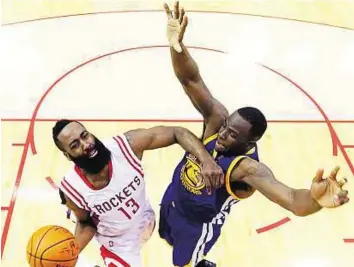  ?? AP ?? Taking off Rockets guard James Harden (left) shoots against Warriors forward Draymond Green during the second half of Game 4 of the NBA Western Conference finals in Houston on Monday.