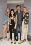  ?? BRYAN BEDDER/GETTY IMAGES FOR H&M ?? Rock-surf band the Atomics star in a “festival season” video and marketing campaign for H&M.