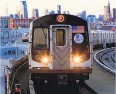  ?? MIZOULA/GETTY IMAGES ?? F train riders in Brooklyn should expect service disruption­s as signal upgrade commences. Shuttle buses will make up the slack.