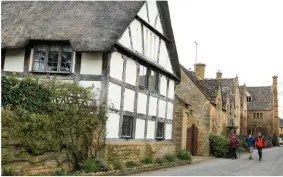  ??  ?? The Cotswold Way sometimes detours downhill to visit villages like Stanton, at the foot of the escarpment.