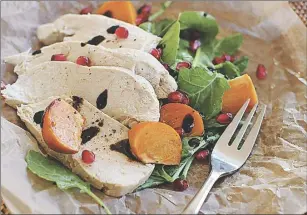  ?? AP PHOTO ?? This recipe for wine-poached chicken breasts produces moist, tender meat that works well in salads, pastas, soups, wraps