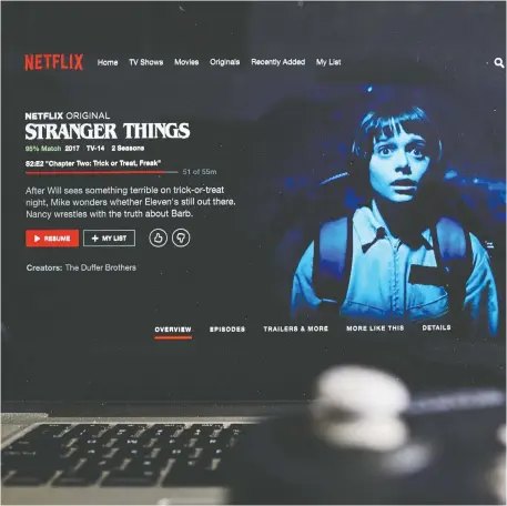  ?? GABBY JONES/BLOOMBERG FILES ?? A group of Bank of America analysts referred to Apple TV+ as “no substitute” for Netflix, which has produced original content hits like Stranger Things. It called the latter’s position “secure” due to having several years of a head start over its new rivals.