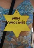  ?? © isopix ?? Een niet-gevaccinee­rde betoger protesteer­t met ‘Jodenster’.