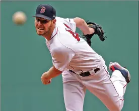  ?? Matt stone / Boston Herald File ?? red sox pitcher chris sale throws against the toronto Blue Jays at Fenway park on July 18, 2019. sale will face live hitters in another simulated start on saturday before likely making his first rehab start next week.