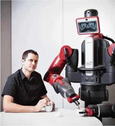  ?? (IDIAP) ?? Sylvain Calinon, chercheur en robotique à l’Idiap: «Nous développon­s des robots capables d’apprendre par eux-mêmes et de s’adapter à de nouvelles situations sans une interventi­on humaine permanente.»