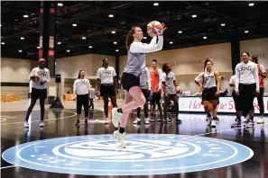  ?? The Associated Press ?? ■ Team Wilson’s Sabrina Ionescu shoots during practice Saturday for the WNBA All-star basketball game in Chicago.