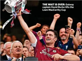  ??  ?? THE WAIT IS OVER: Galway captain David Burke lifts the Liam MacCarthy Cup