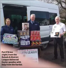  ??  ?? Pat O’Brien (right) from the Duleek & District League delivered Easter goodies with help from the Gardai.